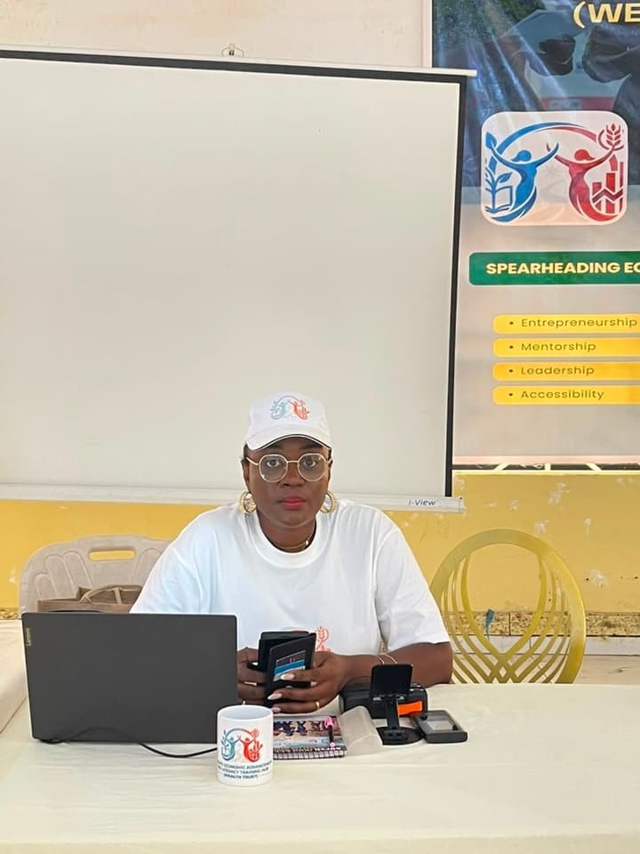 A facilitator at a desk