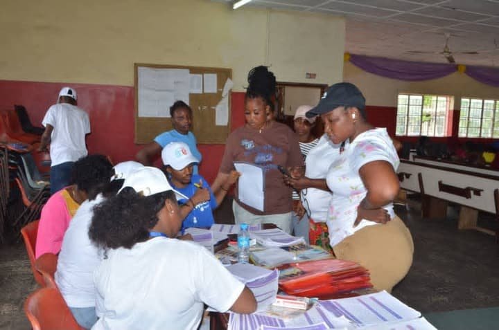 Women registering for a training