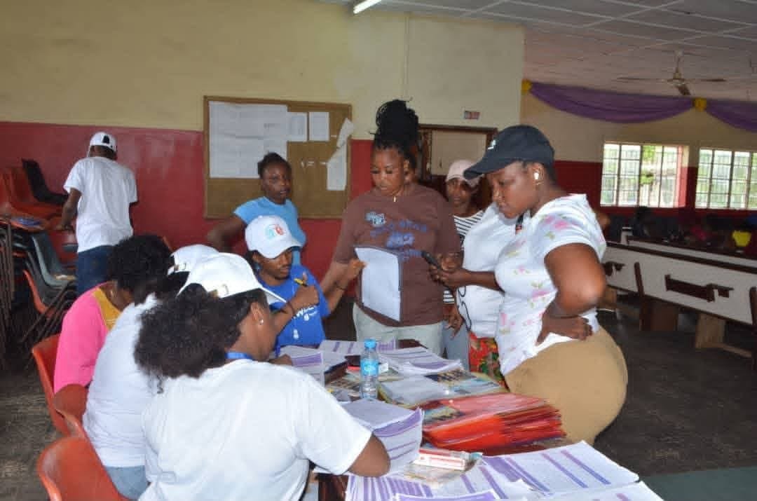 Wealth Trust team welcoming women at a registration table