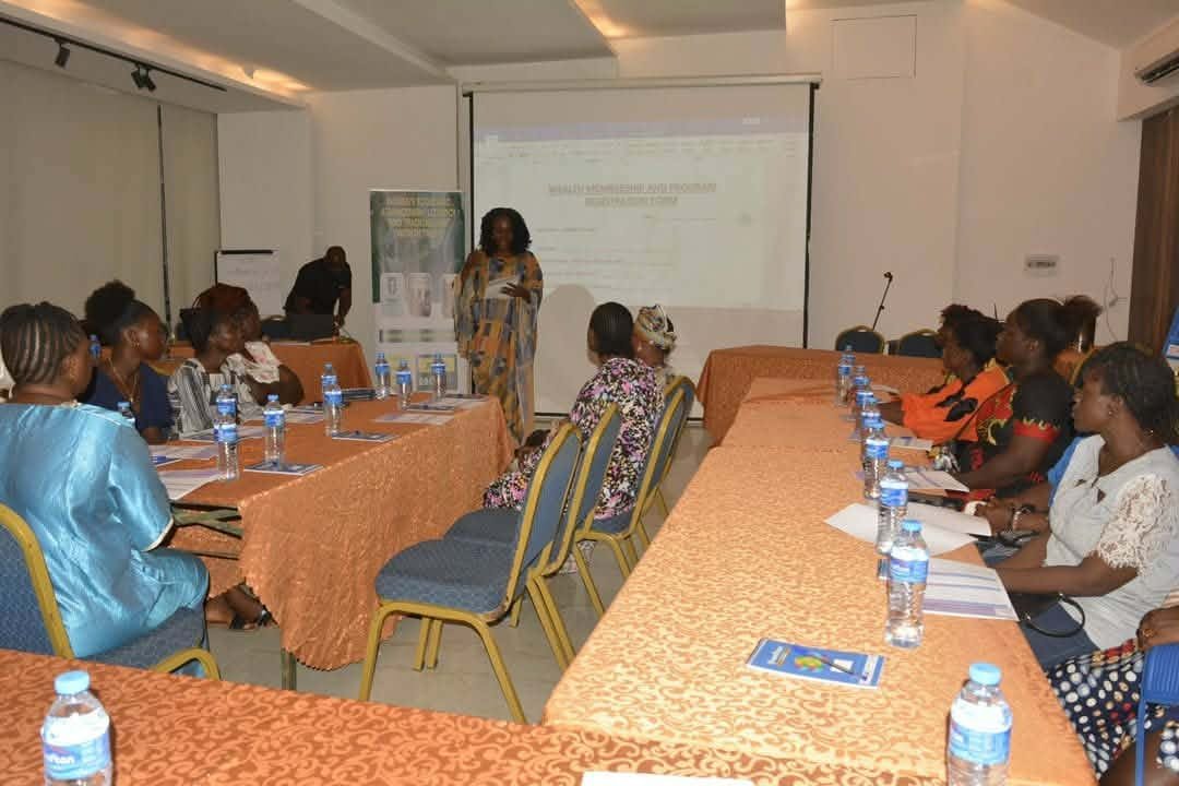 Women seated around tables at a Wealth Trust workshop